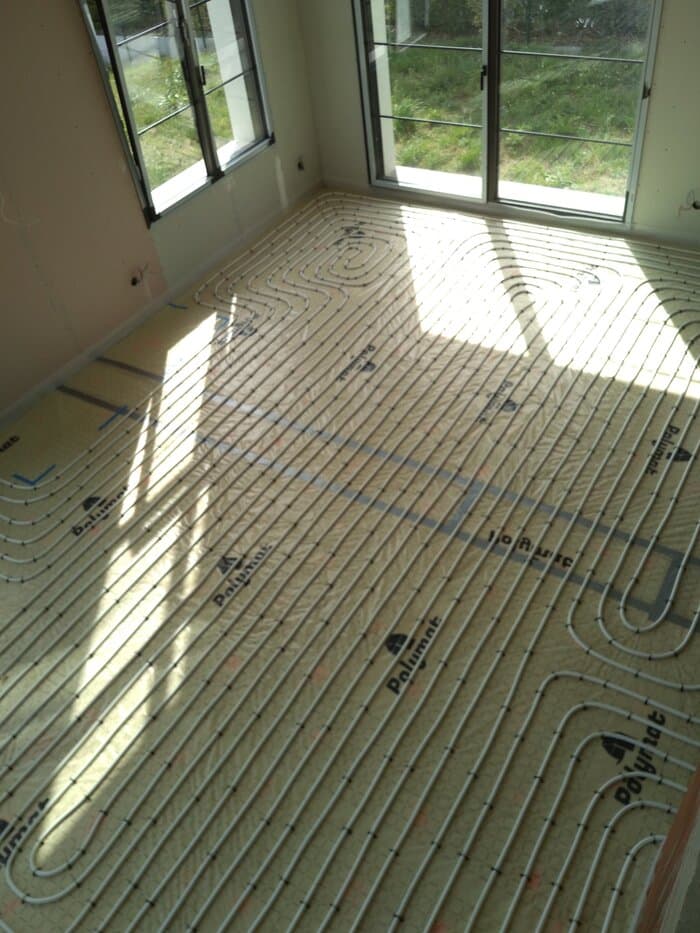 Pose plancher chauffant avec Ouvrard, chauffagiste Les Herbiers